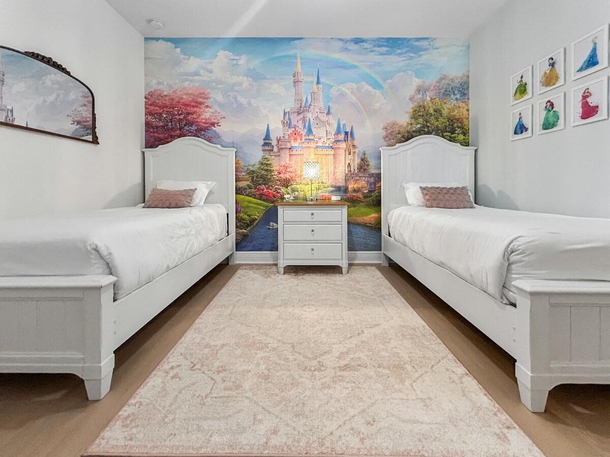 Princess-themed Suite with twin beds, a step stool, and soft magical décor — designed so little ones feel like they're stepping into their own fairy tale. Includes a white noise machine and its own private bathroom.